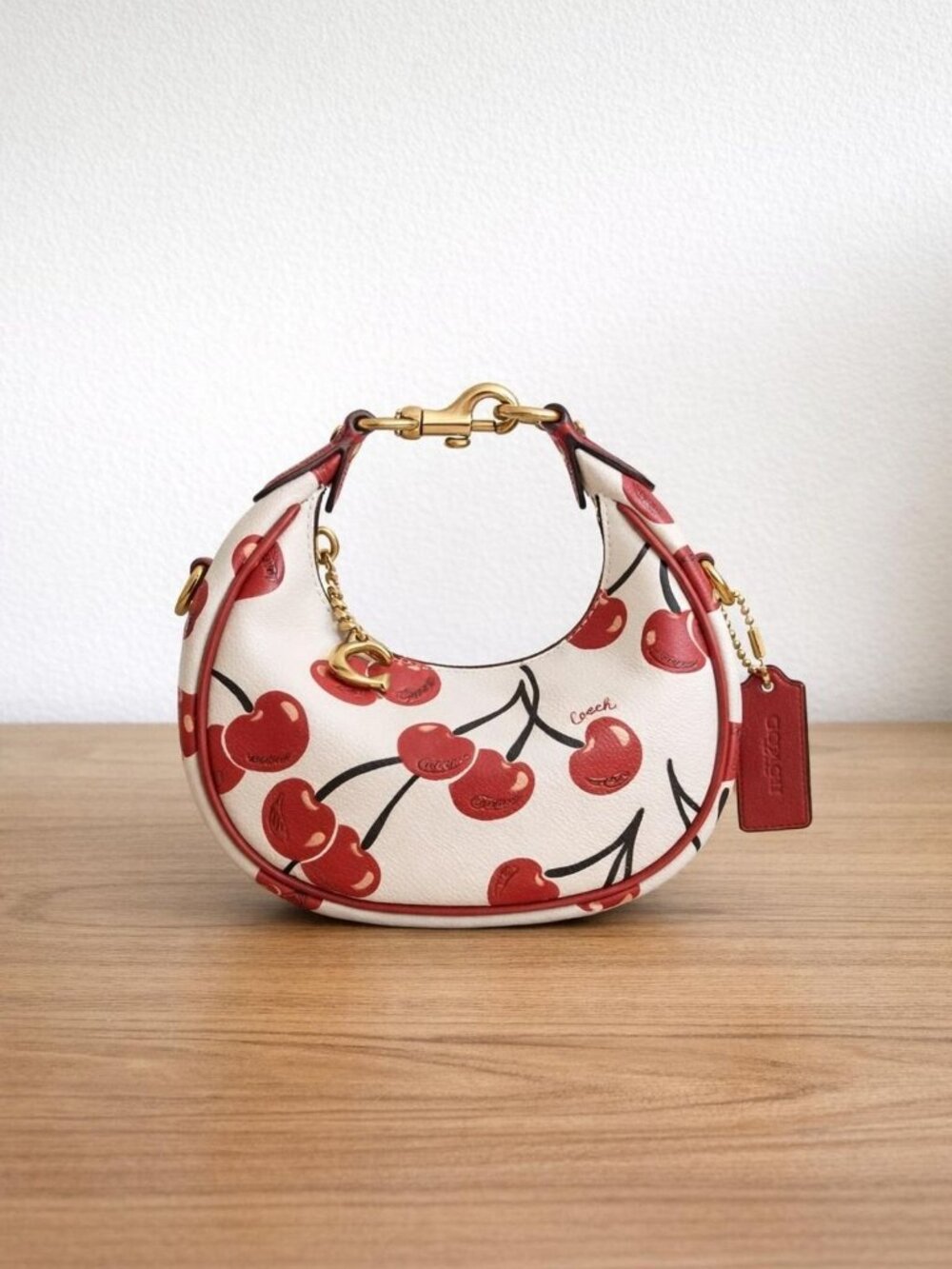 Coach Jonie Leather Crossbody Bag With Cherry Print - Brass/Chalk Multi - Picture 1 of 5